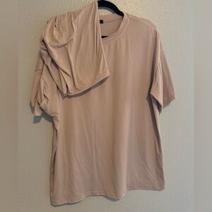 Neutral two piece set. Oversized t shirt with shorts.